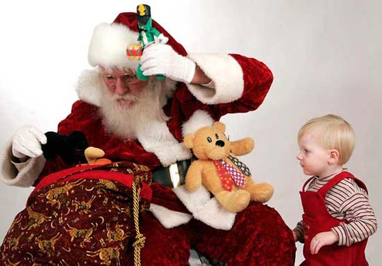 Fear drops away as a child stares in wonderment at what may appear from Santa's Toy Bag next!