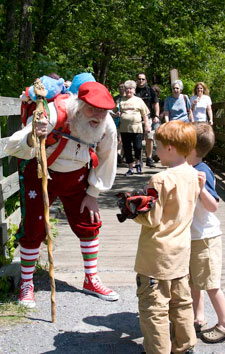 Santa talks with children on the Appalachian Trail in Damascus, VA